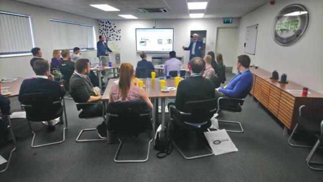 people in a room having training session