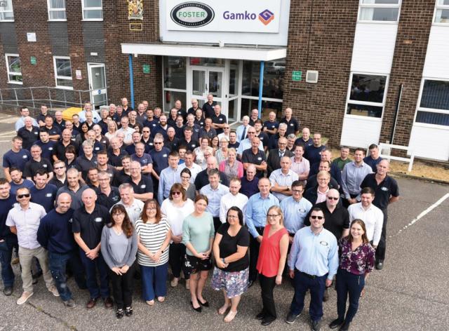 The Foster and Gamko team stand outside the office