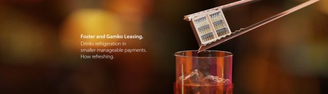 Gamko leasing breaks down payments into manageable chunks as illustrated by a mini bottle cooler being dropped into a glass like an ice cube